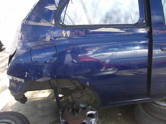 ARIPA DREAPTA SPATE Nissan Micra 2006 - Poza 1